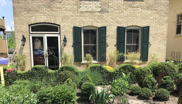 exterior raised panel shutters with arched top.jpg