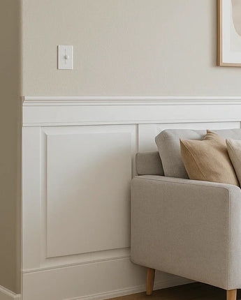 Elegant raised panel wainscoting on living room walls, crafted with customizable MDF panels and detailed upper and lower rails.