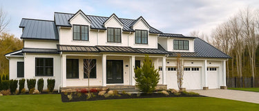 Beautiful modern farmhouse with square pultruded fiberglass columns in Canada. These sleek, durable fiberglass columns provide lasting strength and timeless curb appeal for residential designs. Shop now at Elite Trimworks.