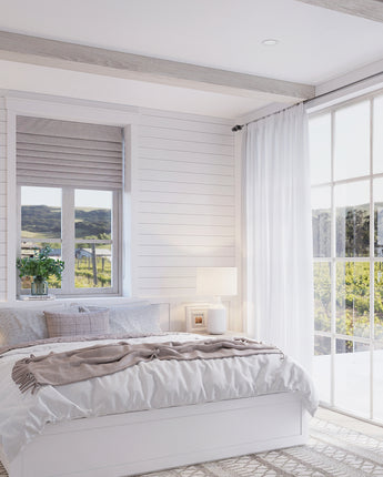 White Oak Hardwood Ceiling Beams installed in a bright bedroom with shiplap walls and white ceilings, showcasing smooth engineered wood construction that resists warping and can be stained to match any interior design style.